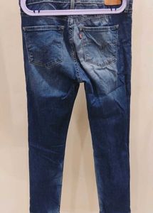 Distressed Blue Denim Jeans