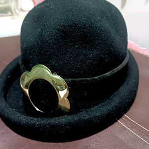 Chic black Cloche Hat with Gold Flower Accent