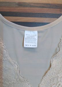 Elegant Nude Bodysuit With Lace Neck Line