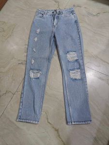 Ripped Light Wash Denim Jeans