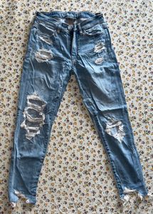 Ripped Light Wash Denim Jeans