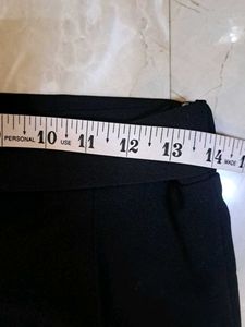 Chic Black High-Waisted Trousers with blue top