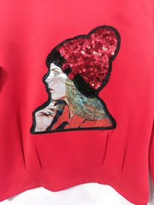 Chic Red Top with Sequin Embellishment