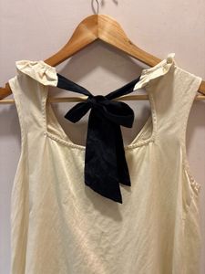 Chic Cream Ruffled Top with Bow Detail
