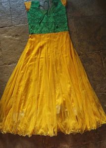 Yellow Net Gown with Green Floral Bodice