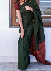 Elegant Green Saree with Red Border