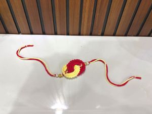 Handmade Crochet Rakhi - Red &amp; Yellow