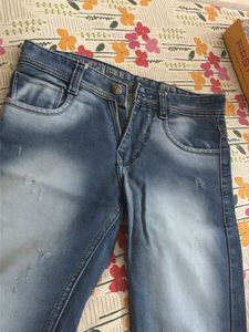 Distressed Blue Denim Jeans