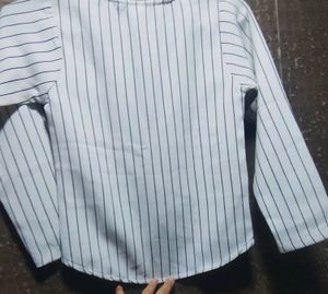 white kids jacket with black lining