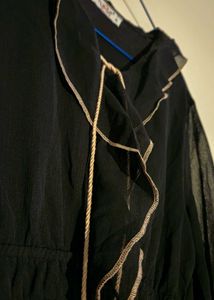 Black Abaya with Cream-colored Ruffle Trim