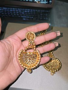 gold pearls mang tikka and earrings
