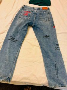 Womens Blue Jeans and green fitted top