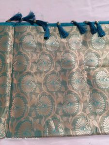 Elegant Teal and Gold Brocade Saree