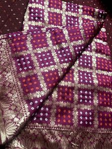 Elegant Burgundy Saree with Golden Motifs