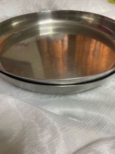 2 heavy steel dinner plates