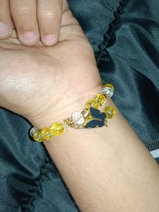 Charming Yellow Beaded Bracelet with Butterfly Cha