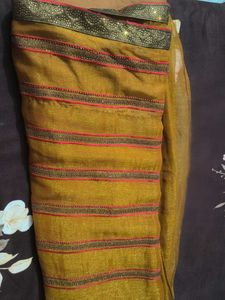 Elegant mustard heavy party wear saree with blouse