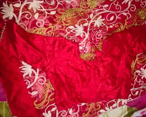 Net embroidery red saree with stitched blouse