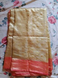 Elegant Gold Saree with Pink Border