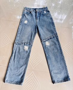 Ripped Light Wash Denim Jeans
