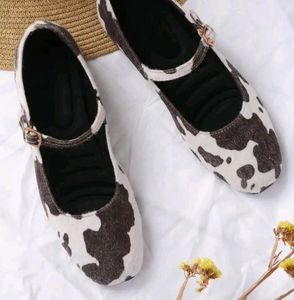 pair of multicoloured Mary Janes