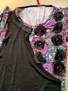 Very Little Used Purple Top With flower Design