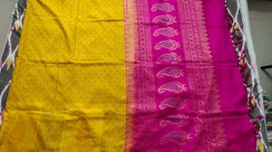 Vibrant Yellow Saree with Intricate Pattern