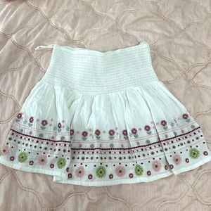 White Smocked Mini Skirt with Floral Embroidery