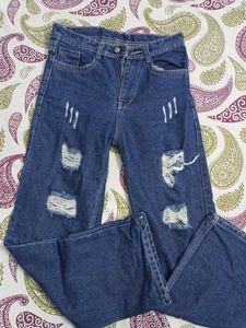 Distressed Blue Denim Jeans