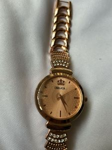 Elegant Rose Gold Watch with Crown Detail