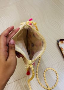 Embroidered Clutch with Tassels
