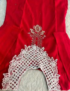 Elegant Red Kurta Set with Intricate White Necklin