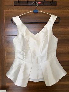 Elegant White Peplum Top