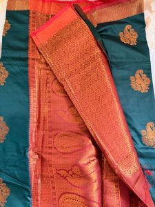 Elegant Dark Green Saree with Reddish maroon Borde