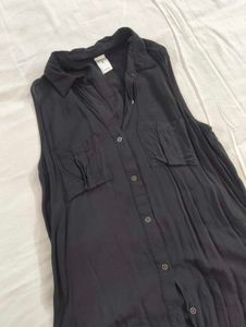 Sleeveless Black Collared Button-Up Shirt