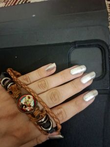 Vintage wristband with ironman charm