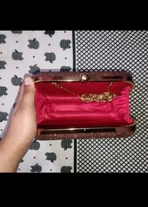 Maroon clutch