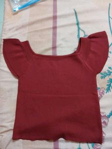 Chic Red Top with Bow Detail
