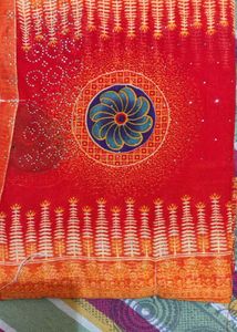Vibrant Red Saree with Intricate Designs