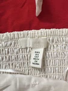 H&amp;M White Tie-Strap Peplum Top