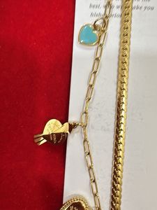 Gold Tone Charm Bracelet