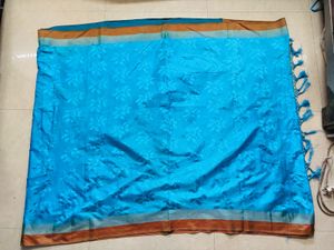 Elegant Teal Saree with Leaf Motif