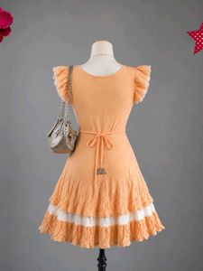 Peachy polka dot dress with belt