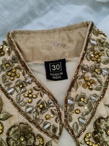 Elegant Beige and Mint Embroidered Lehenga