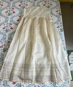 Elegant Cream Ethnic Gown with Swan Embellishments