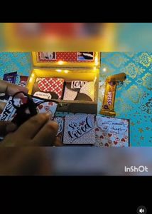 gift box with 10 cards inside and chocolte