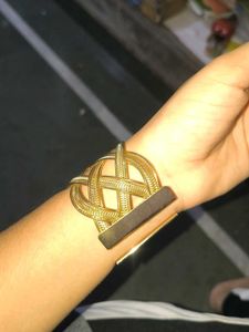 Elegant Gold Tone Knot Bracelet