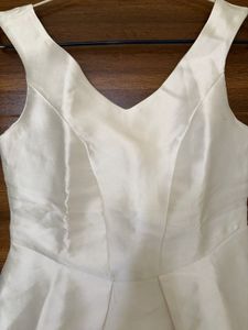 Elegant White Peplum Top