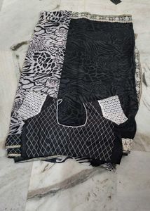 Elegant Black Saree with Animal Print