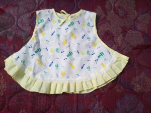 Cute Baby Girl's White Bib with Yellow Trim